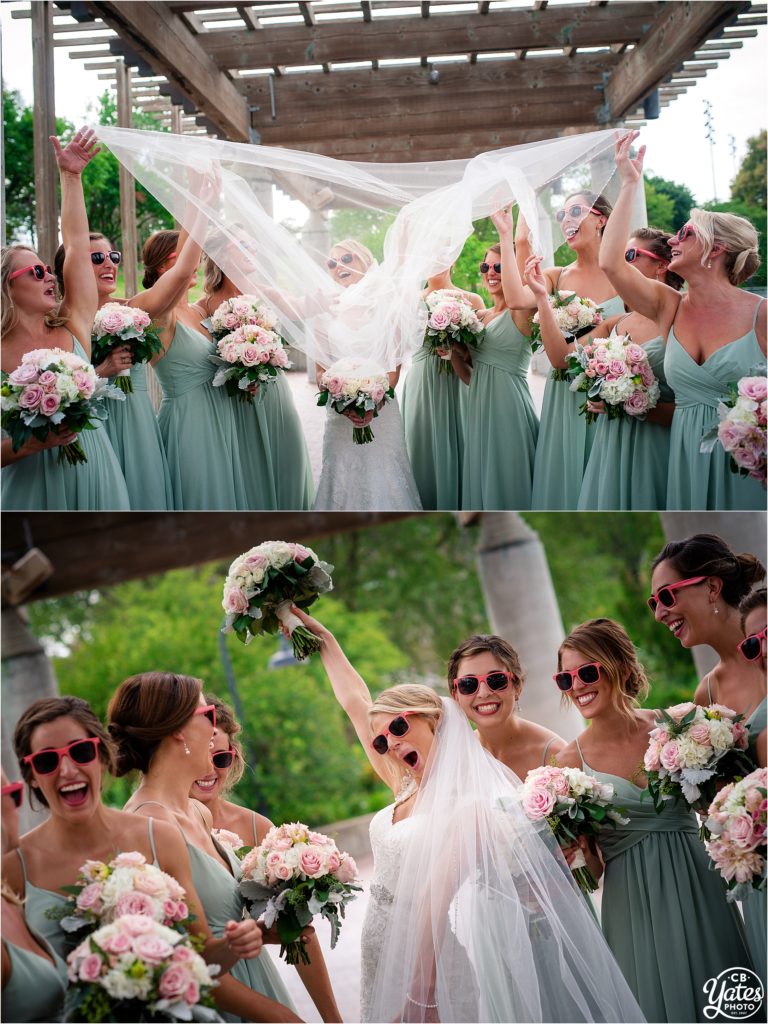 Bridesmaids holding Bride's Veil